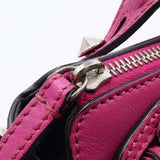 Close-up of Mini bags hardware and fine stitching