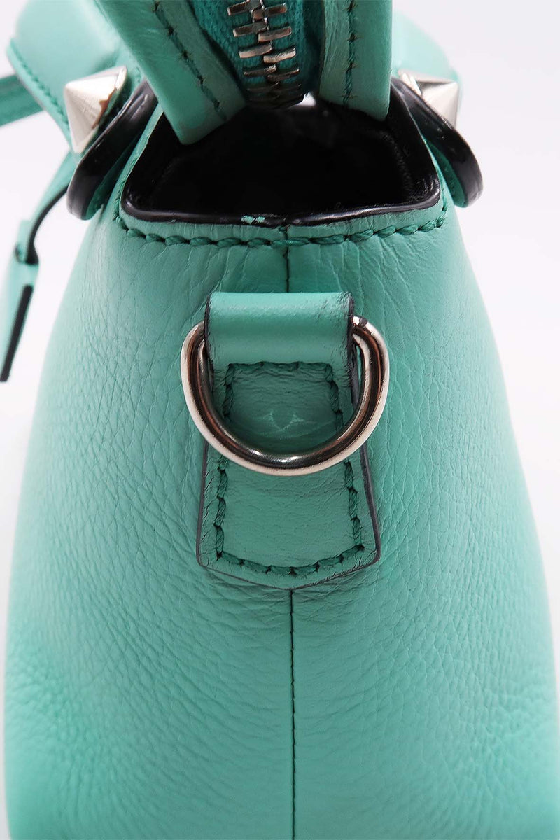 Close-up of Mini bags hardware and fine stitching