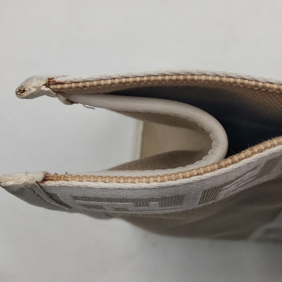 Monogram premium bags detail and craftsmanship close-up