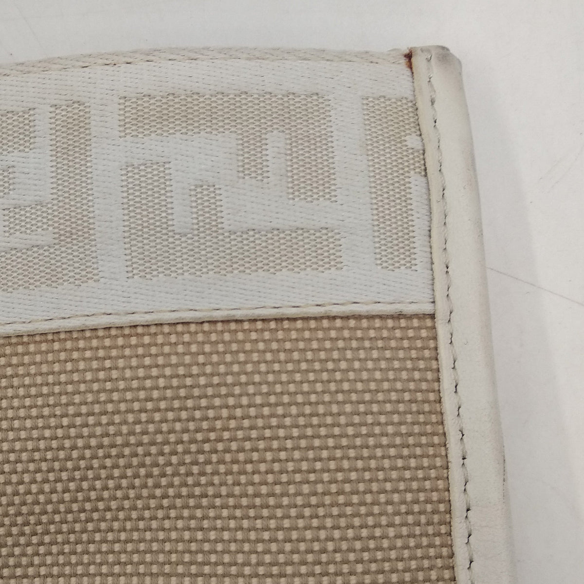 Monogram premium bags detail and craftsmanship close-up