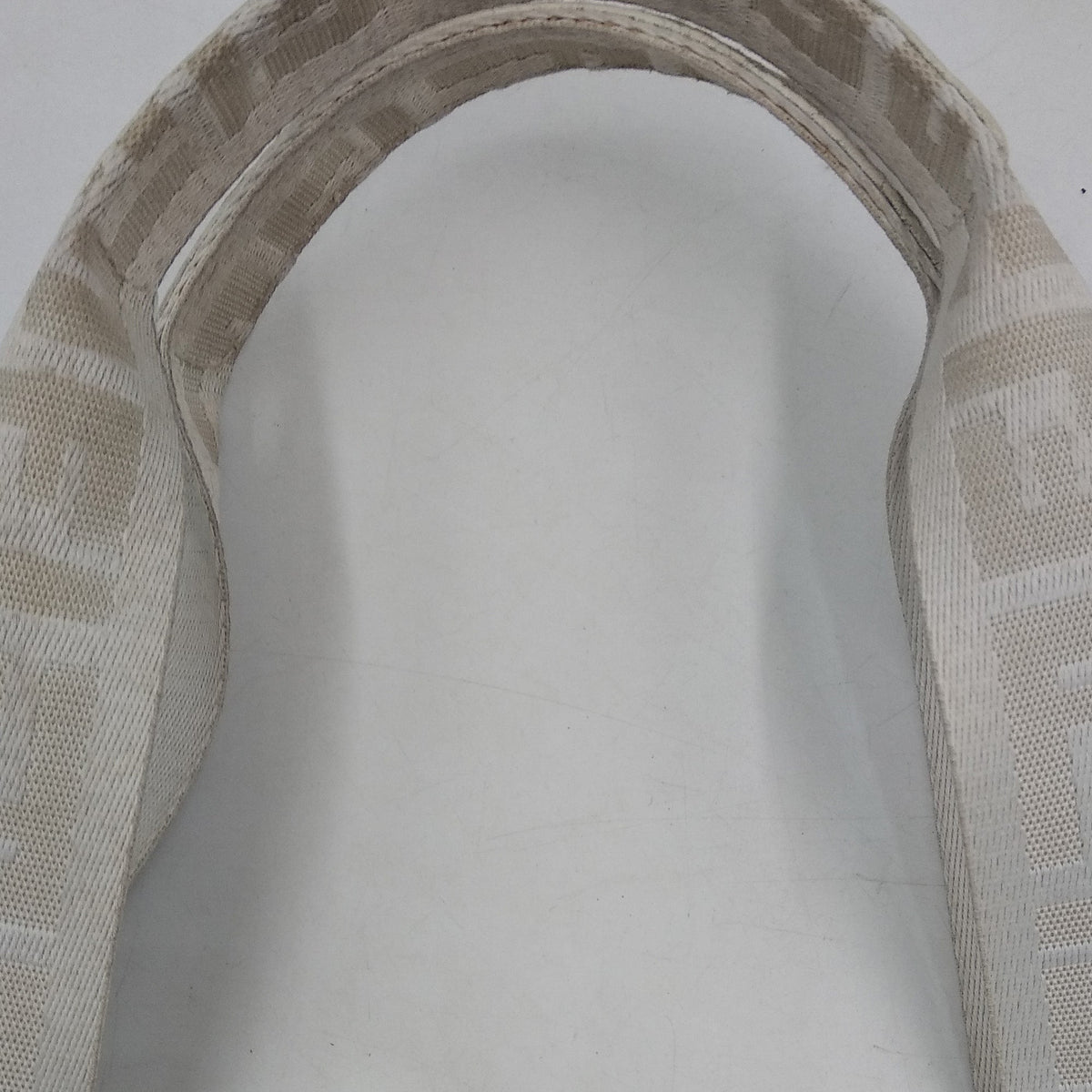 Close-up of Monogram bags hardware and fine stitching