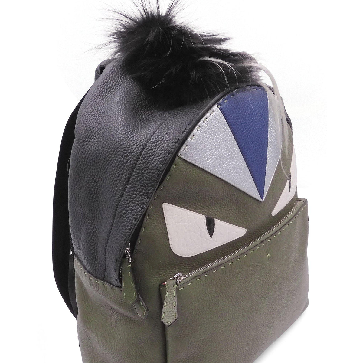 Close-up of Monster bags hardware and fine stitching