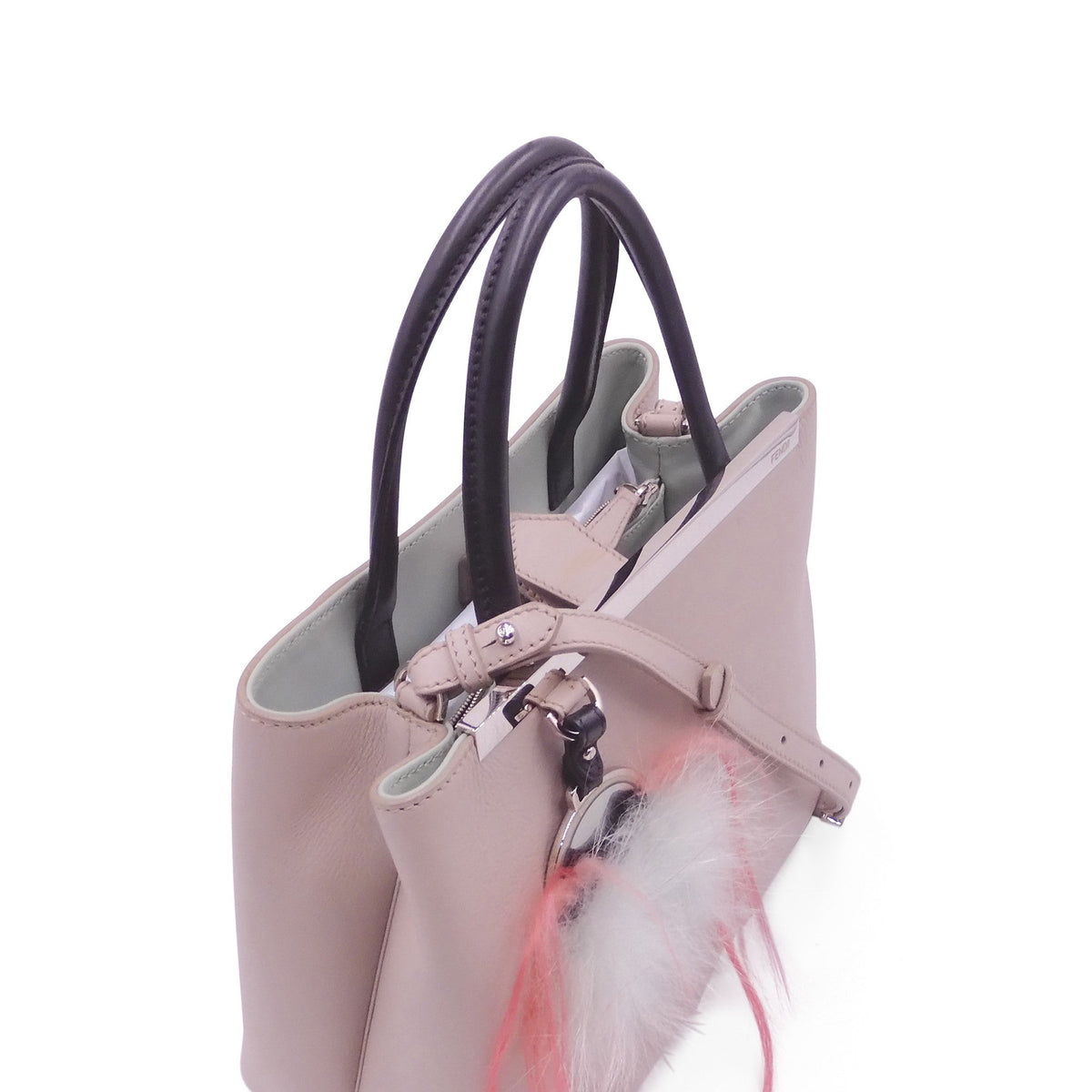 Close-up of Petite bags hardware and fine stitching