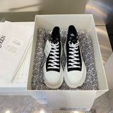Alexander McQueen White Chunky Platform Sneakers - Lifestyle Styling Shot