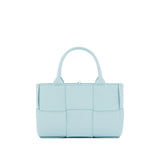 Close-up of Bottega Veneta shoulder bags hardware and fine stitching