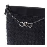 Close-up of Bottega Veneta cross body bags hardware and fine stitching