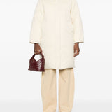 Bottega Veneta premium coats detail and craftsmanship close-up