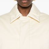 Close-up of Bottega Veneta coats hardware and fine stitching