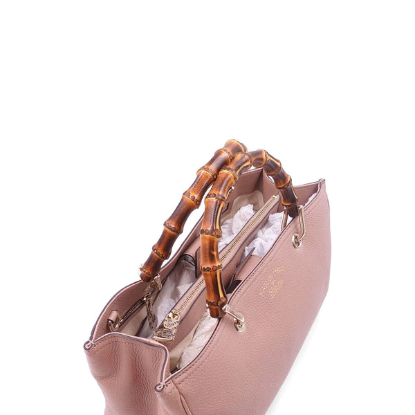 Close-up of Bamboo bags hardware and fine stitching
