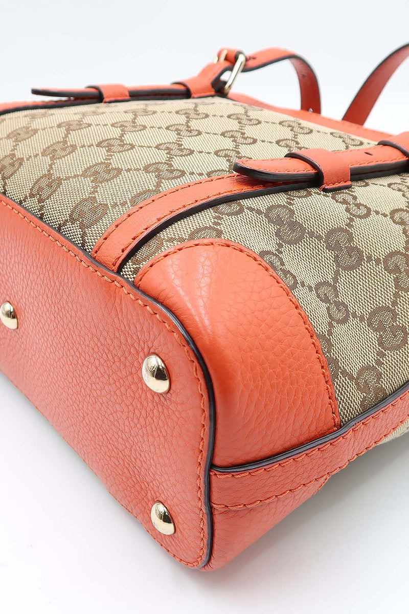 Close-up of Belted bags hardware and fine stitching
