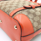 Close-up of Belted bags hardware and fine stitching