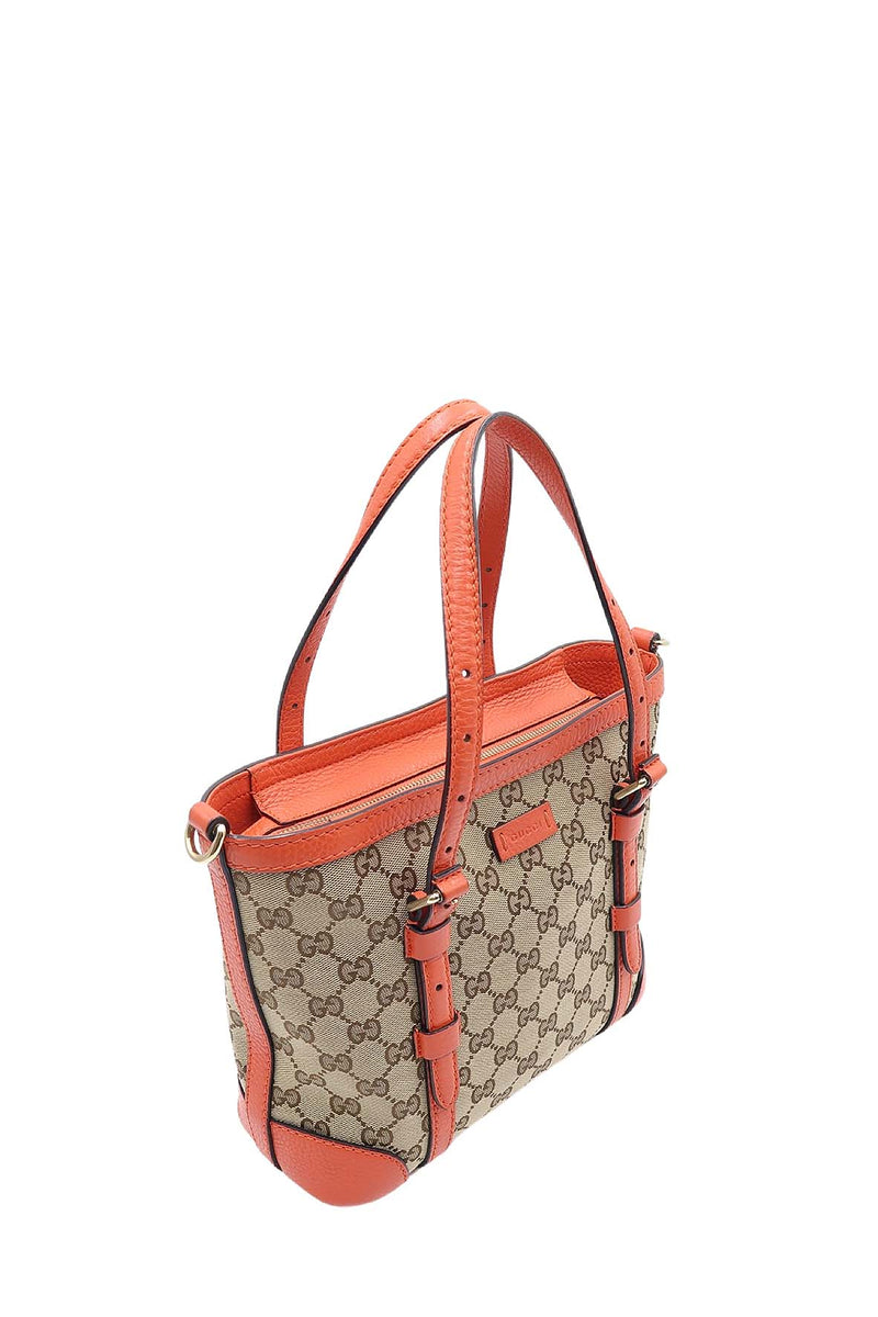 Close-up of Belted bags hardware and fine stitching