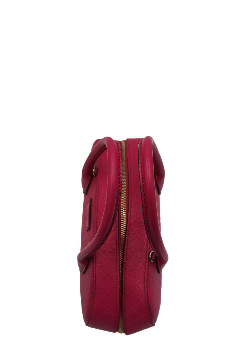 Close-up of Bright bags hardware and fine stitching
