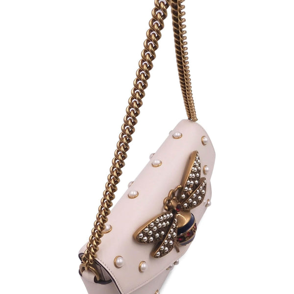 Close-up of Broadway bags hardware and fine stitching