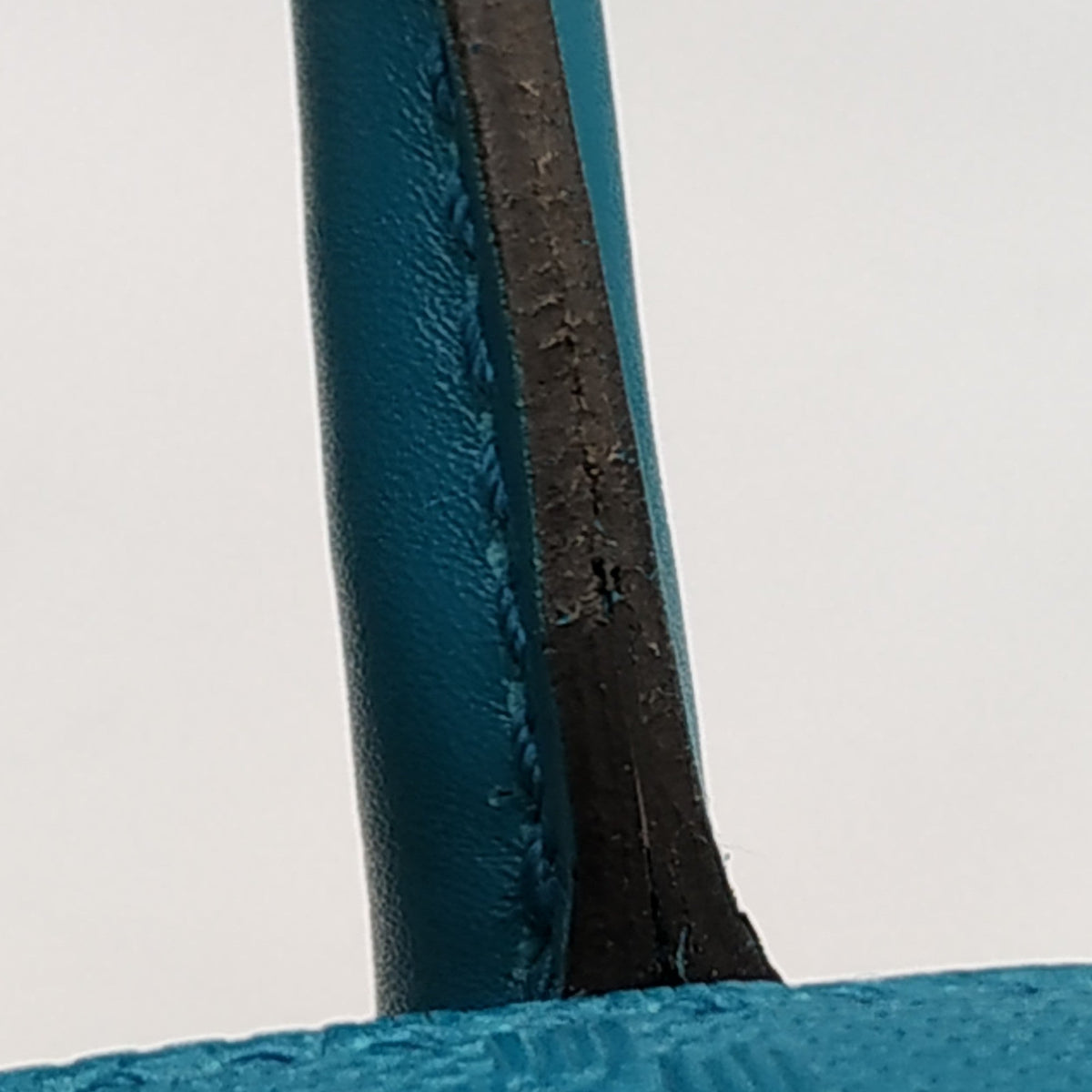 Close-up of Diamante bags hardware and fine stitching