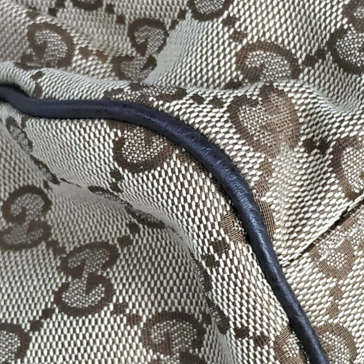 Close-up of GG bags hardware and fine stitching