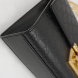 Close-up of GG bags hardware and fine stitching