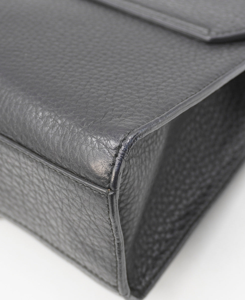 Close-up of Gucci bags hardware and fine stitching