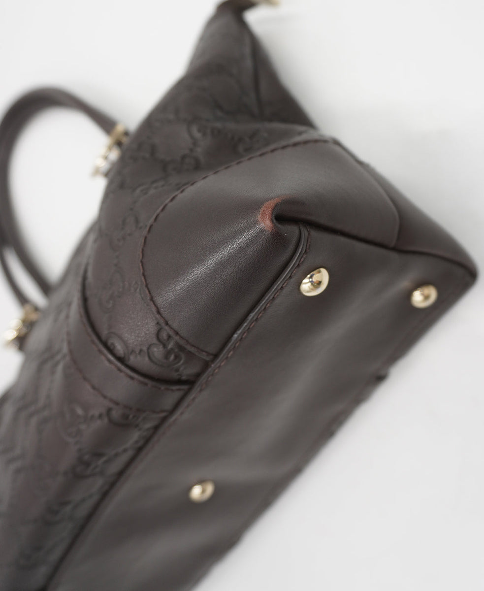 Close-up of Gucci bags hardware and fine stitching