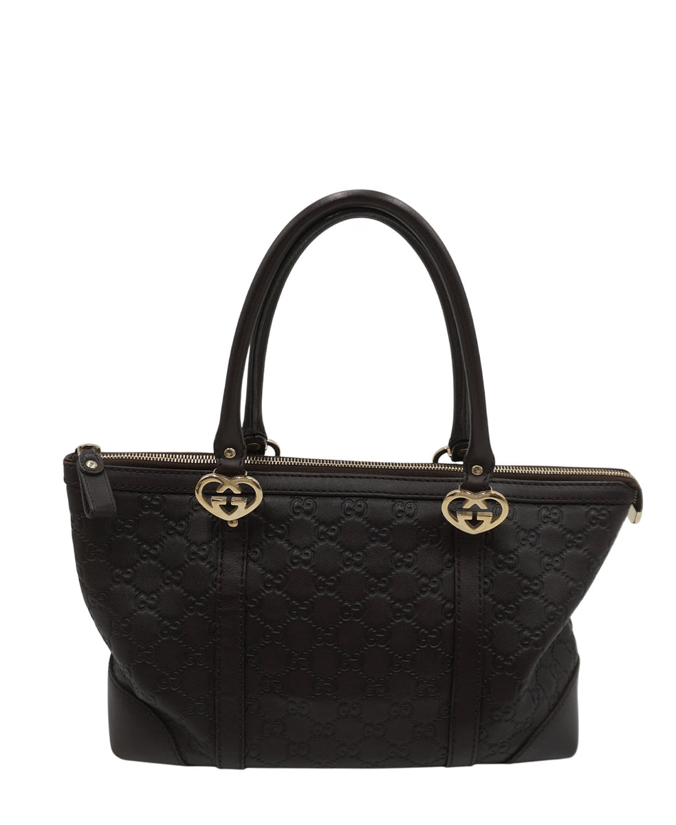 Close-up of Gucci bags hardware and fine stitching