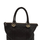Close-up of Gucci bags hardware and fine stitching