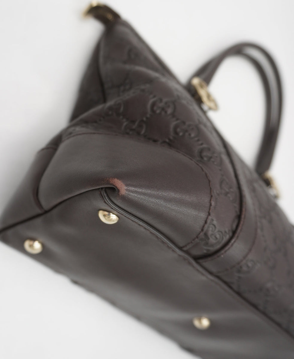 Close-up of Gucci bags hardware and fine stitching