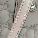 Close-up of Heart bags hardware and fine stitching