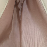 Close-up of Interlocking bags hardware and fine stitching