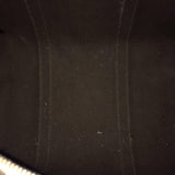 Close-up of Joy bags hardware and fine stitching