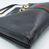 Close-up of Maxi bags hardware and fine stitching