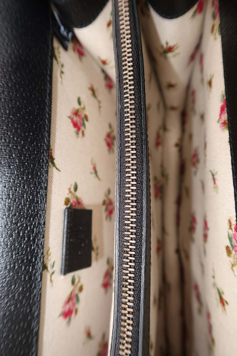 Close-up of Medium bags hardware and fine stitching