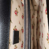 Close-up of Medium bags hardware and fine stitching