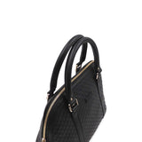 Close-up of Gucci bags hardware and fine stitching
