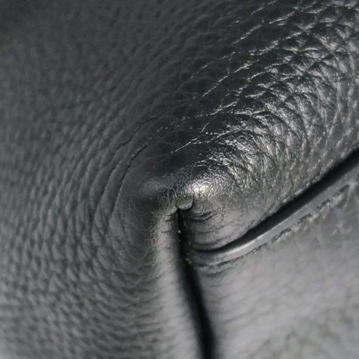 Close-up of Medium bags hardware and fine stitching