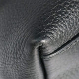 Close-up of Medium bags hardware and fine stitching