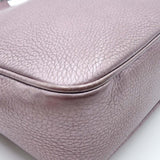 Close-up of Metallic bags hardware and fine stitching