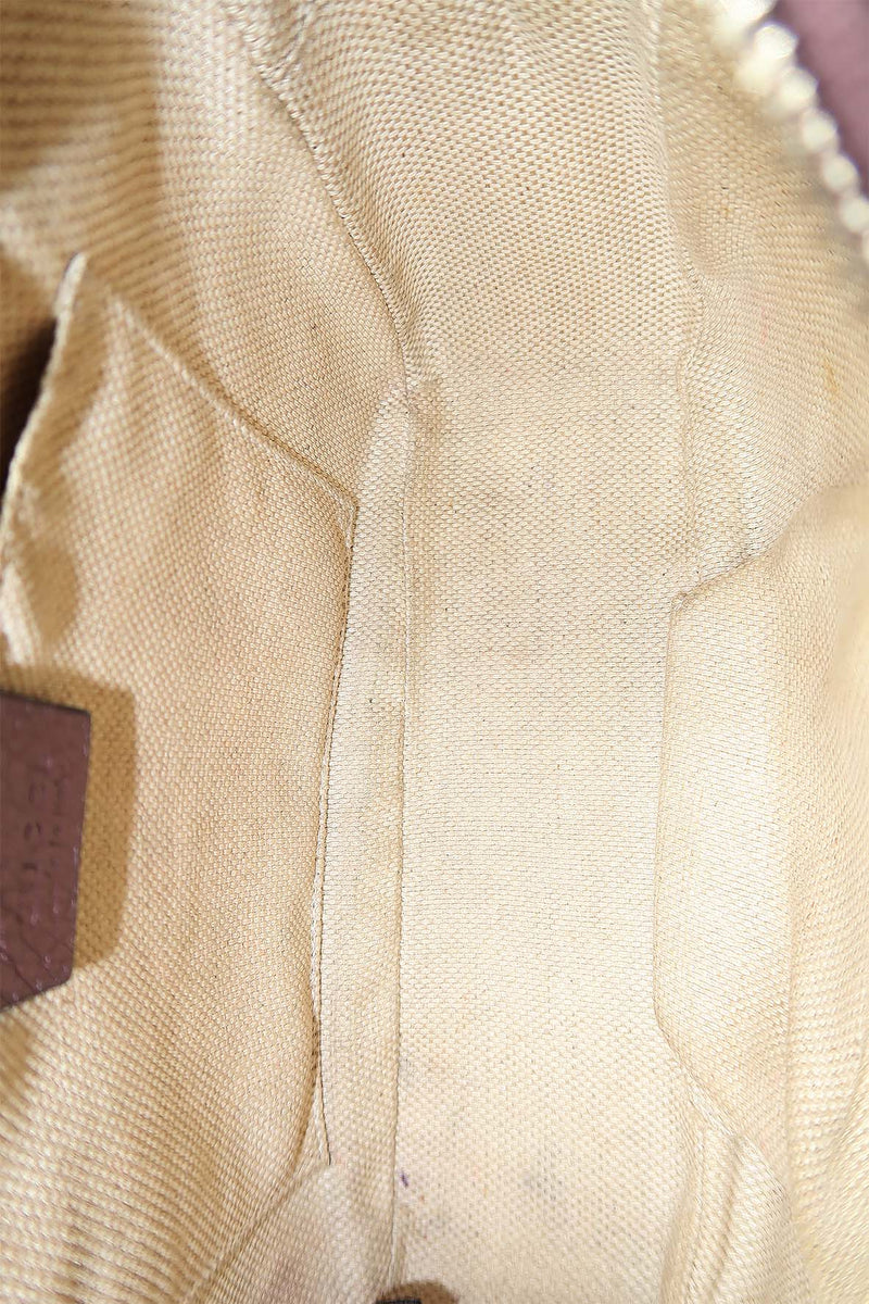 Close-up of Metallic bags hardware and fine stitching