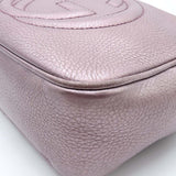 Close-up of Metallic bags hardware and fine stitching