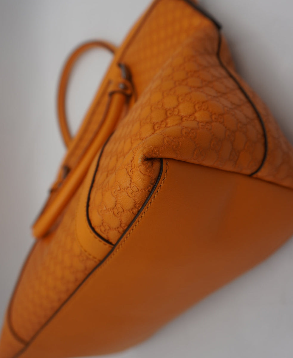 Close-up of Gucci bags hardware and fine stitching