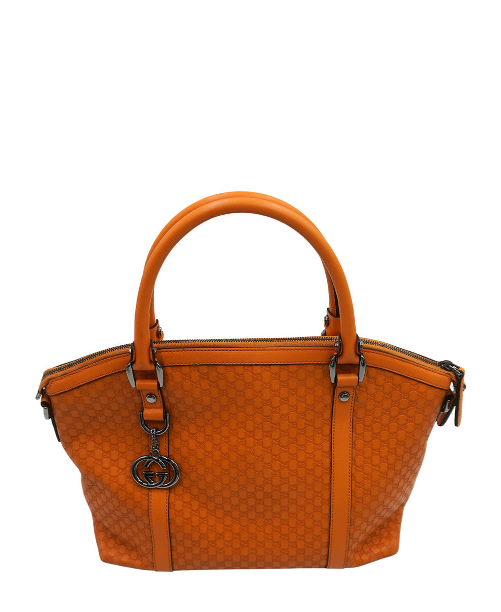 Close-up of Gucci bags hardware and fine stitching