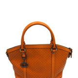 Close-up of Gucci bags hardware and fine stitching