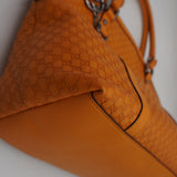 Close-up of Gucci bags hardware and fine stitching