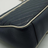 Close-up of GG bags hardware and fine stitching