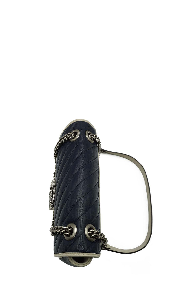 Close-up of GG bags hardware and fine stitching
