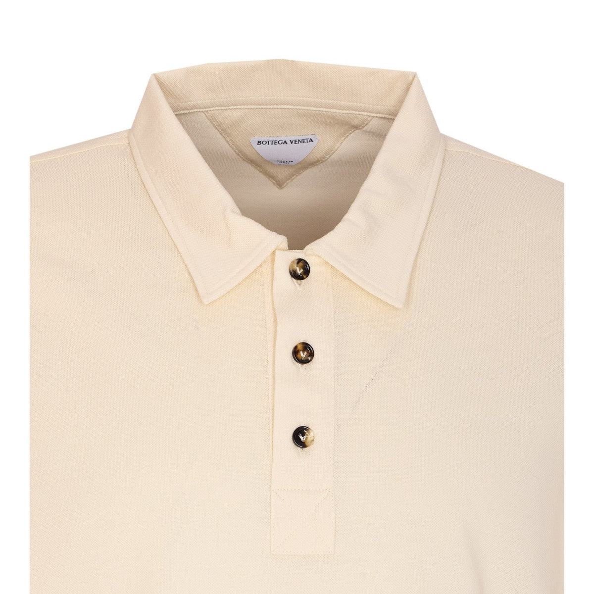 Close-up of Bottega Veneta tee shirts hardware and fine stitching