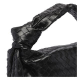 Close-up of Bottega Veneta shoulder bags hardware and fine stitching