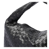 Close-up of Bottega Veneta shoulder bags hardware and fine stitching