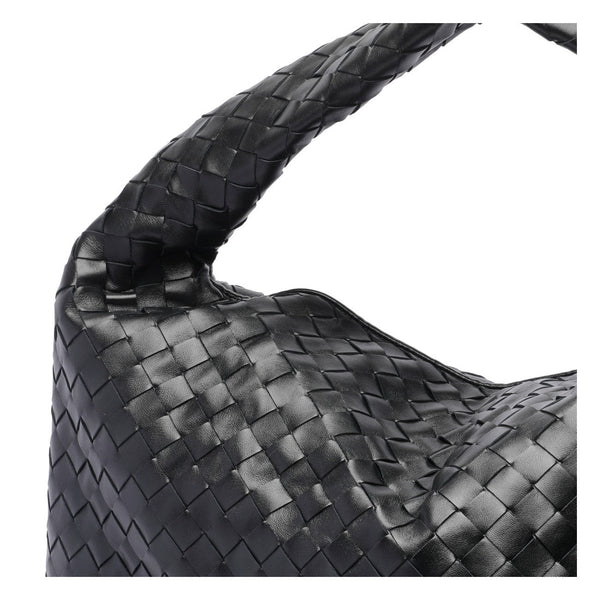 Close-up of Bottega Veneta shoulder bags hardware and fine stitching