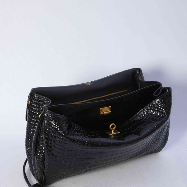 Close-up of Balenciaga shoulder bags hardware and fine stitching
