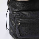 Close-up of Balenciaga backpacks hardware and fine stitching